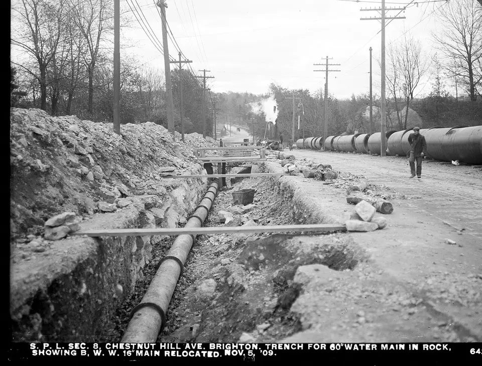 Water line work at the street — trench and mains